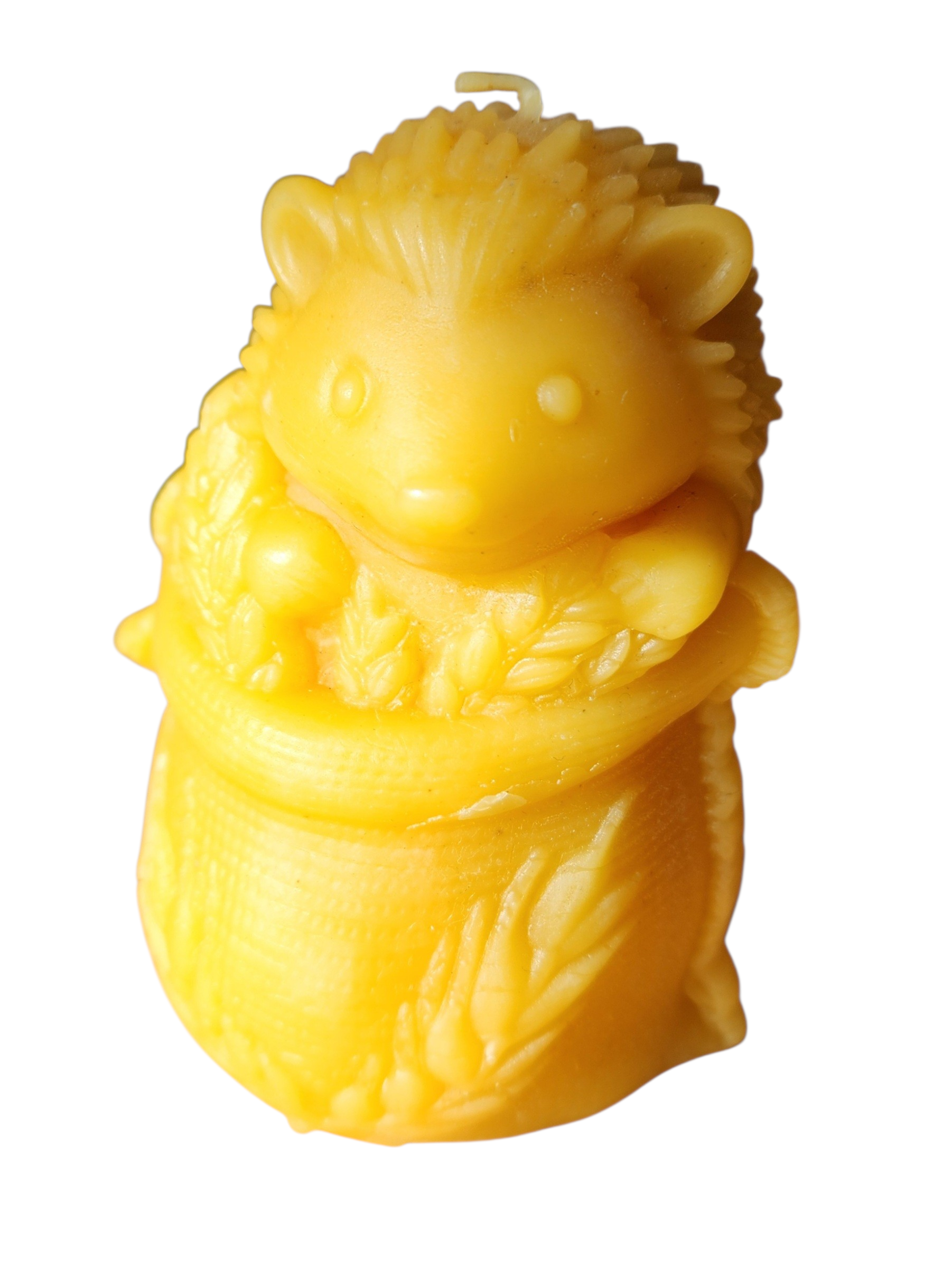 Bougie hérisson dans un sac de blé